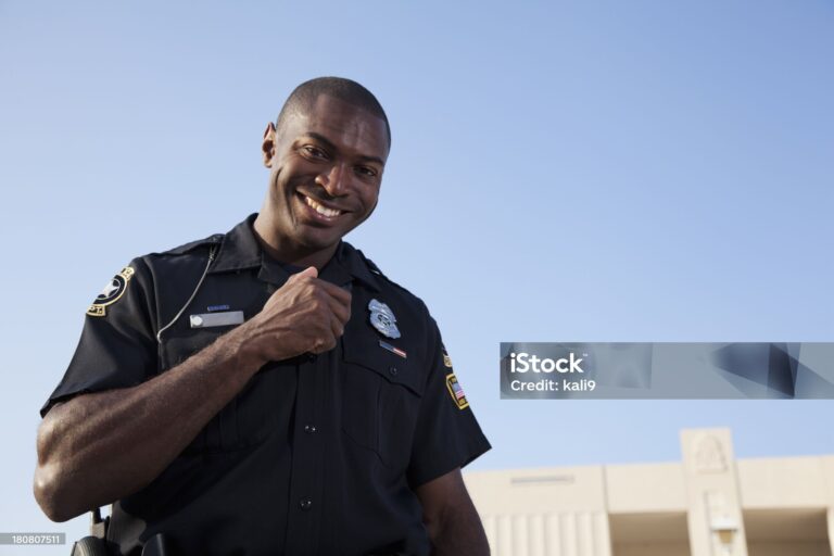 Young, African American police officer (20s)